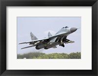 Framed Serbian Air Force MiG-29 departing with two AA-8 Aphid missiles