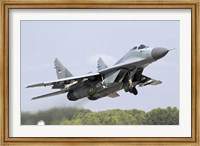 Framed Serbian Air Force MiG-29 departing with two AA-8 Aphid missiles