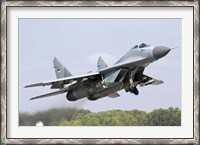 Framed Serbian Air Force MiG-29 departing with two AA-8 Aphid missiles