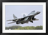 Framed Serbian Air Force MiG-29 departing with two AA-8 Aphid missiles