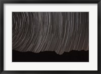 Framed Star trails above a valley in the Firoozkooh area, Iran