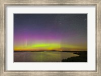 Framed faint aurora over Crawling Lake reservoir, Bassano, Alberta, Canada