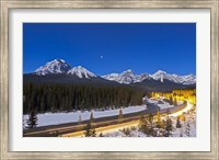 Framed moonlit nightscape over the Bow River and Morant's Curve in Banff National Park, Canada