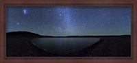 Framed panoramic view of the Milky Way and La Azul lagoon in Somuncura, Argentina