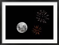 Framed composite image with fireworks and a new Moon