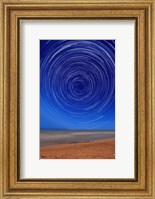 Framed Star trails around the south celestial pole at the beach in Miramar, Argentina