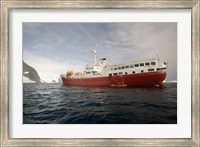 Framed Expedition ship and zodiac, Pleneau Island, Antarctica
