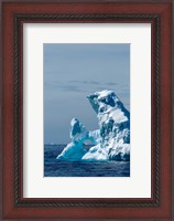 Framed arched iceberg floating in Gerlache Strait, Antarctica.