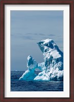 Framed arched iceberg floating in Gerlache Strait, Antarctica.