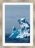 Framed arched iceberg floating in Gerlache Strait, Antarctica.