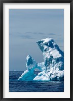 Framed arched iceberg floating in Gerlache Strait, Antarctica.