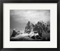 Framed Antarctica, Mountain peaks along Cape Renaud in Lemaire Channel.