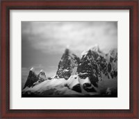 Framed Antarctica, Mountain peaks along Cape Renaud in Lemaire Channel.