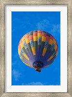 Framed Rainbow colored hot air balloon over Namib Desert, Sesriem, Namibia