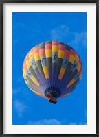 Framed Rainbow colored hot air balloon over Namib Desert, Sesriem, Namibia