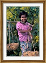 Framed Girl with Painted Face Carrying Basket on Shoulder Pole, Myanmar