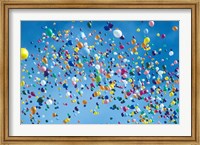 Framed Holiday balloons drifting into the sky