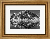 Framed Antarctica, Mountain peaks reflected in the Lemaire Channel.