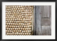 Framed Cowrie shells on wall of building, Ibo Island, Morocco