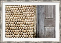 Framed Cowrie shells on wall of building, Ibo Island, Morocco