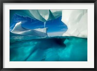 Framed Antarctica, Arched Iceberg floating near Enterprise Island.