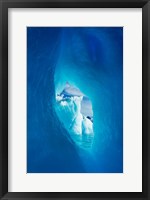 Framed Antarctica, Iceberg framed in arch of another in Wilhelmina Bay.