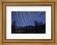 Framed Star trails above mountain peaks near Yosemite National Park, California