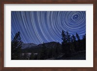 Framed Star trails above mountain peaks near Yosemite National Park, California