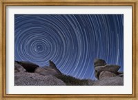Framed boulder outcropping and star trails in Anza Borrego Desert State Park, California