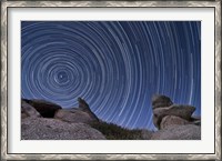 Framed boulder outcropping and star trails in Anza Borrego Desert State Park, California
