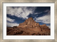 Framed Red rock formation illuminatd by moonlight in Arches National Park, Utah