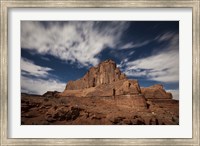 Framed Red rock formation illuminatd by moonlight in Arches National Park, Utah