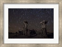 Framed Star trails above sand tufa formations at Mono Lake, California