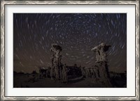 Framed Star trails above sand tufa formations at Mono Lake, California