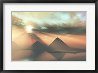 Framed Sunrays shine down on three pyramids along the Nile River on the Giza Plateau