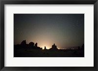 Framed Large tufa formations at Trona Pinnacles against a backdrop of stars