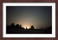 Framed Large tufa formations at Trona Pinnacles against a backdrop of stars