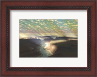 Framed Sunrays shine down on mist over a canyon river in a desert wilderness