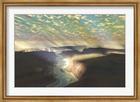 Framed Sunrays shine down on mist over a canyon river in a desert wilderness