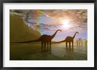 Framed Two Diplodocus dinosaurs wade through shallow water to eat some vegetation