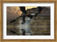 Framed Two Microraptor dinosaurs fly near mountain waterfalls in prehistoric times