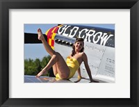 Framed Cute pin-up girl sitting on the wing of a P-51 Mustang