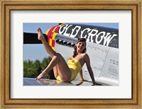 Framed Cute pin-up girl sitting on the wing of a P-51 Mustang