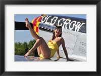 Framed Cute pin-up girl sitting on the wing of a P-51 Mustang