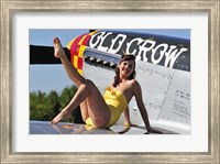 Framed Cute pin-up girl sitting on the wing of a P-51 Mustang