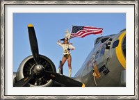 Framed 1940's style majorette pin-up girl on a B-17 bomber with an American flag