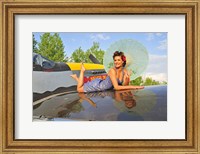 Framed 1940's style pin-up girl with parasol on a vintage P-51 Mustang