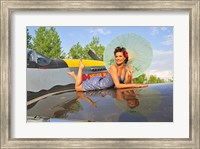 Framed 1940's style pin-up girl with parasol on a vintage P-51 Mustang