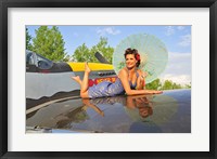 Framed 1940's style pin-up girl with parasol on a vintage P-51 Mustang