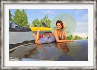 Framed 1940's style pin-up girl with parasol on a vintage P-51 Mustang